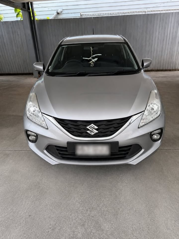 Silver Suzuki Baleno after detailing